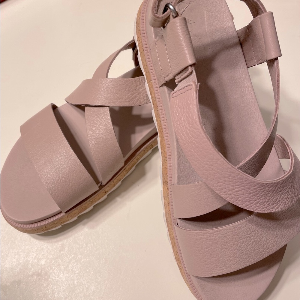 Mushroom color sandals with Velcro strap.